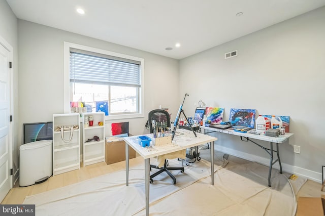 office with hardwood / wood-style flooring