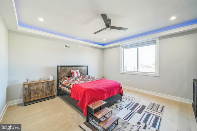 bedroom featuring light wood-type flooring and ceiling fan