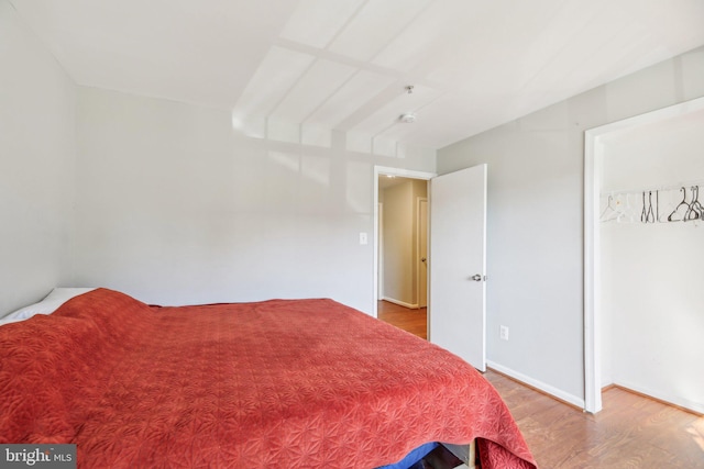 bedroom featuring hardwood / wood-style floors