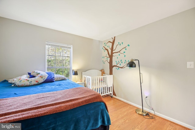 bedroom featuring hardwood / wood-style flooring