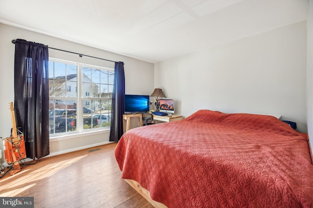 bedroom featuring hardwood / wood-style flooring