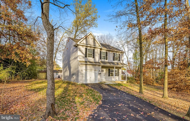 front of property featuring a garage