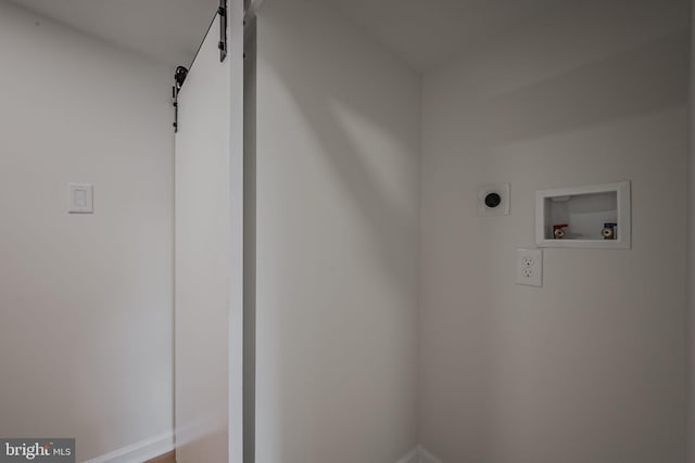 laundry area with hookup for an electric dryer and hookup for a washing machine