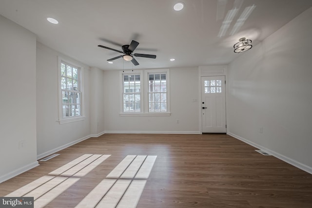 foyer entrance featuring ceiling fan and hardwood / wood-style flooring