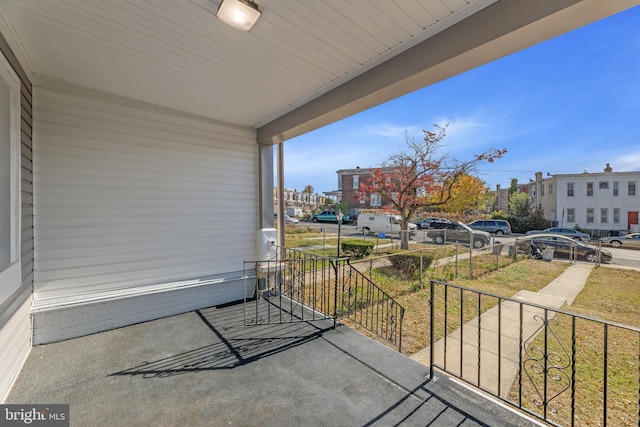 balcony featuring a porch