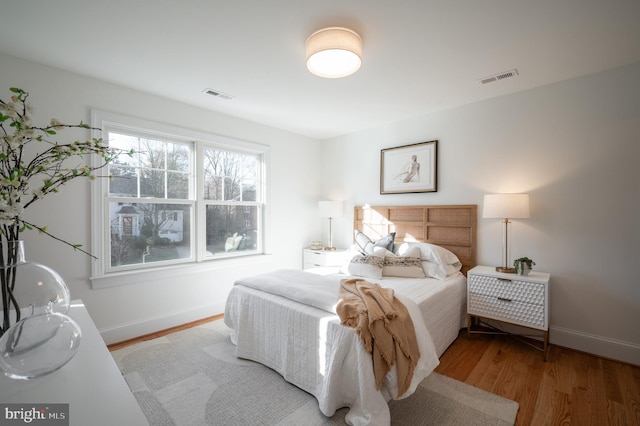 bedroom featuring hardwood / wood-style floors