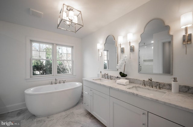 bathroom featuring shower with separate bathtub and vanity