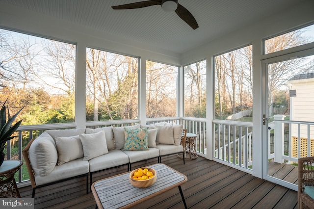 sunroom / solarium with ceiling fan