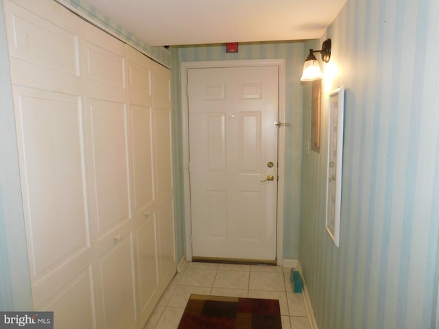 doorway featuring light tile patterned floors