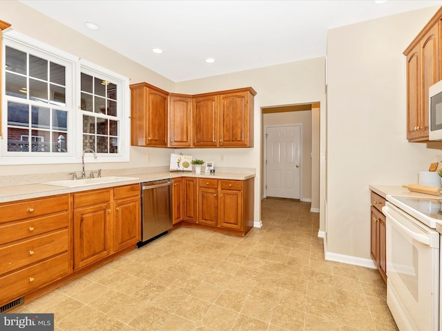 kitchen with sink and stainless steel appliances