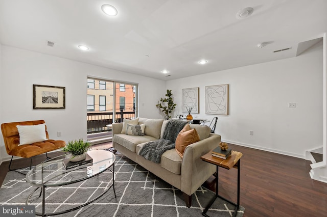 living room featuring dark hardwood / wood-style floors