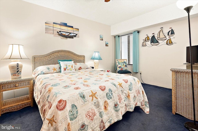 carpeted bedroom with a textured ceiling