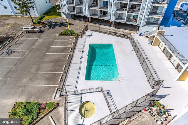 view of swimming pool with a patio area