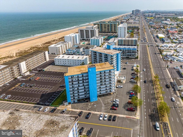 bird's eye view with a view of the beach and a water view