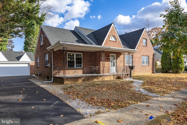 view of front of home with a garage and covered porch