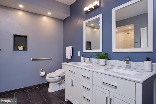 bathroom with walk in shower, tile patterned flooring, vanity, and toilet