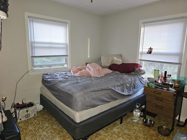 bedroom featuring a textured ceiling