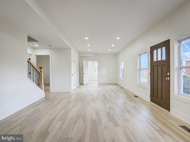 entrance foyer featuring light hardwood / wood-style floors