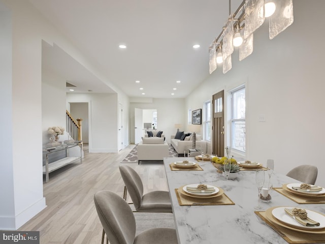 dining space featuring light hardwood / wood-style flooring