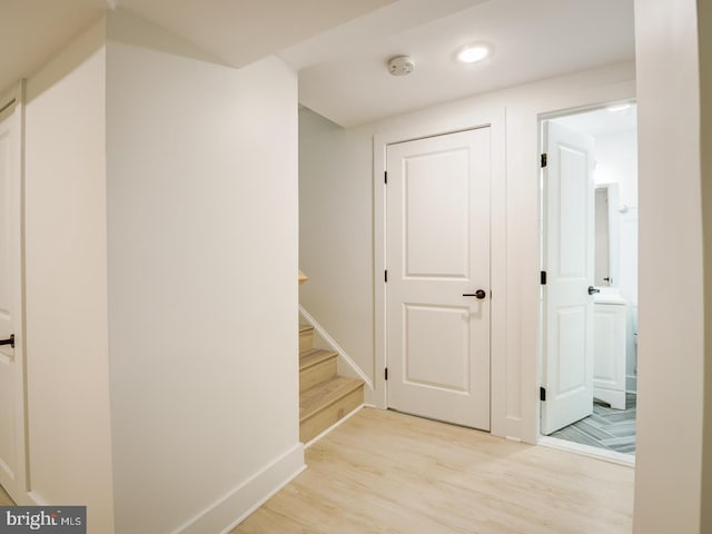 hallway featuring light wood-type flooring