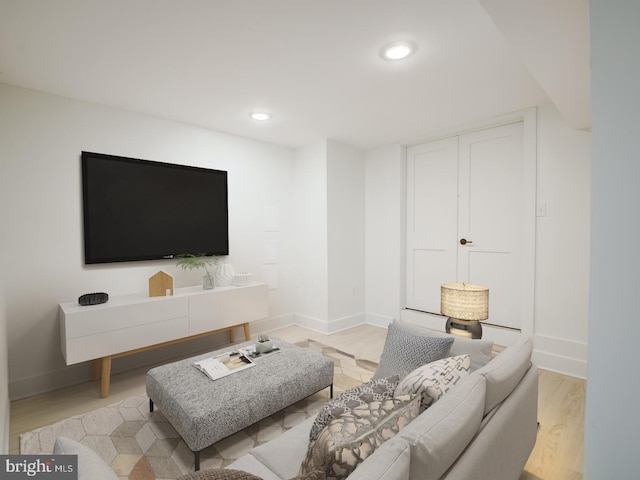 living room with light hardwood / wood-style flooring