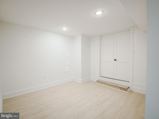 spare room with light wood-type flooring