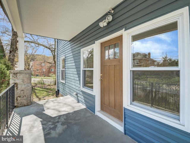 doorway to property with a porch