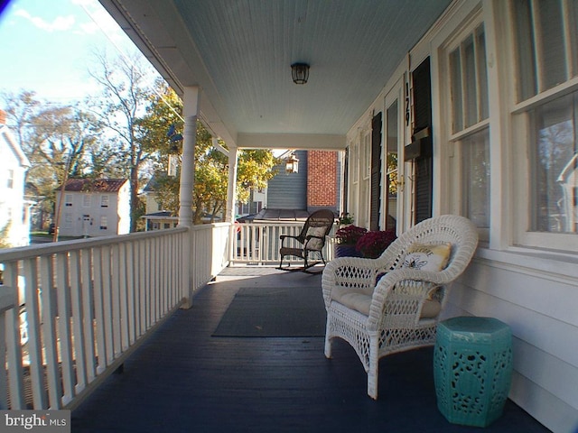 deck featuring covered porch