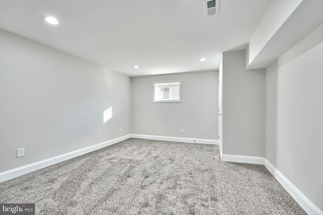 basement featuring carpet flooring