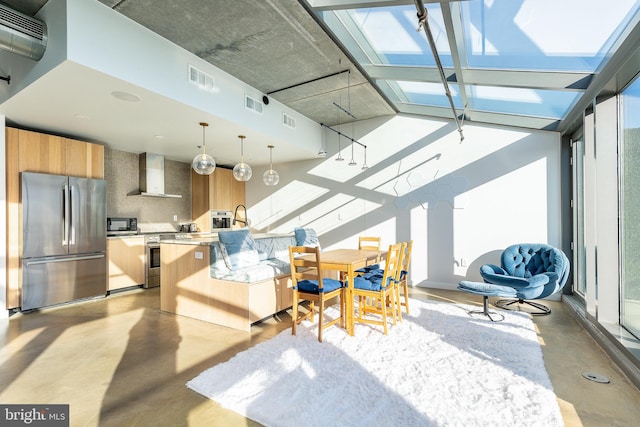 interior space with a skylight and a wealth of natural light