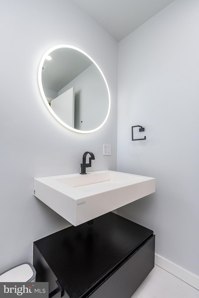 bathroom with tile patterned flooring and toilet