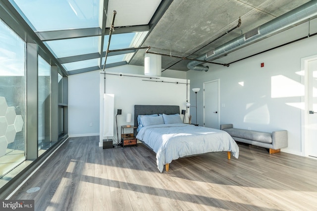 bedroom featuring hardwood / wood-style floors