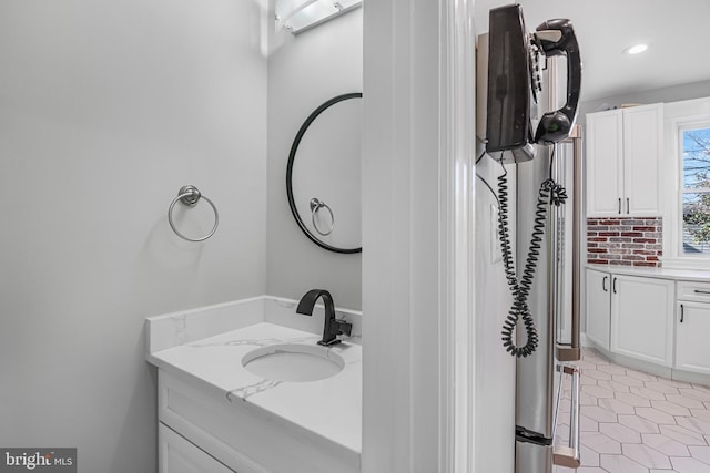 bathroom featuring vanity