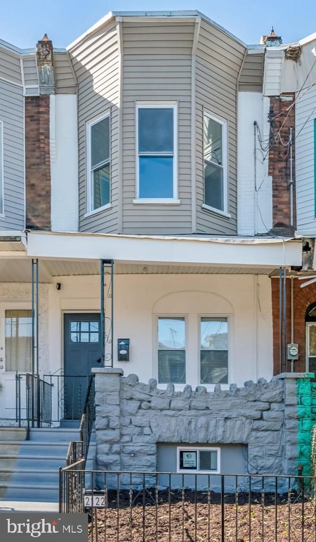 view of front of home featuring covered porch