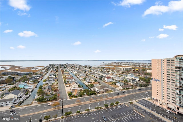 drone / aerial view with a water view