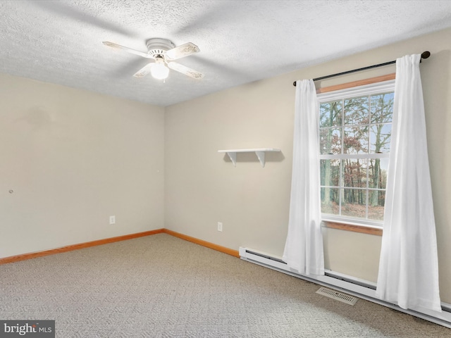 carpeted empty room featuring a textured ceiling, a baseboard radiator, and ceiling fan