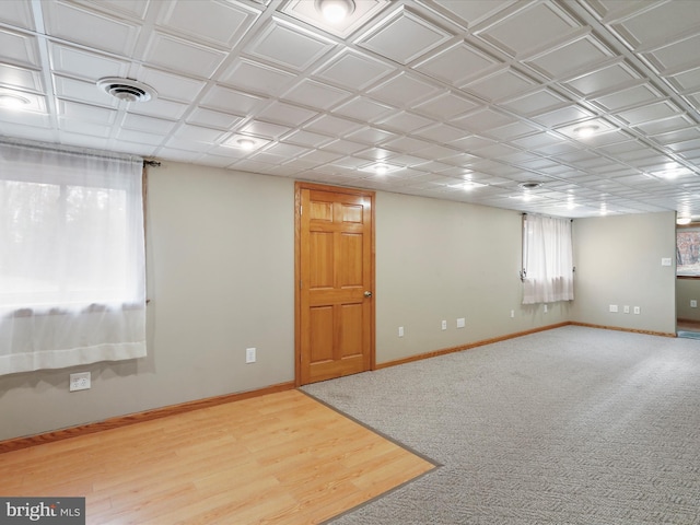 basement with wood-type flooring