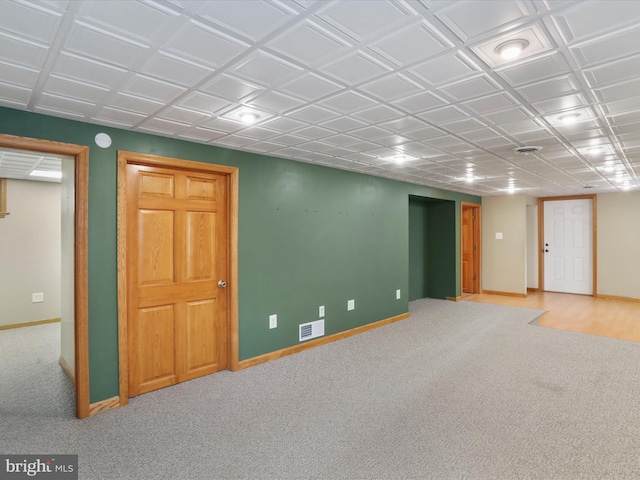 basement with light carpet