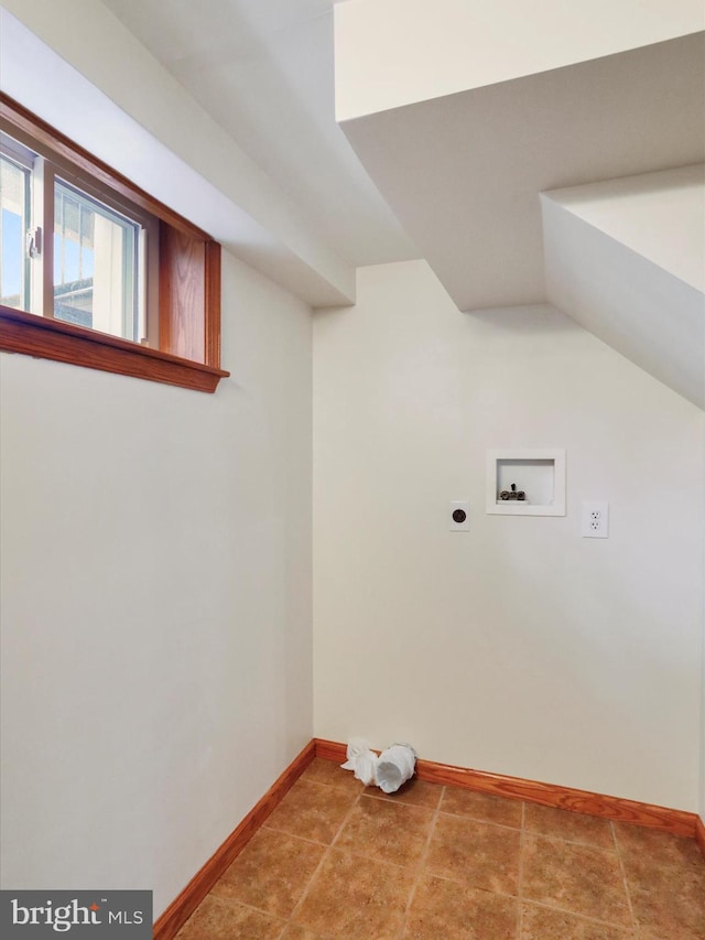 laundry room with tile patterned floors, washer hookup, and hookup for an electric dryer