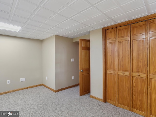 unfurnished bedroom featuring light colored carpet