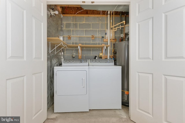 washroom with independent washer and dryer and water heater