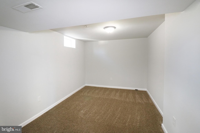 basement with carpet flooring