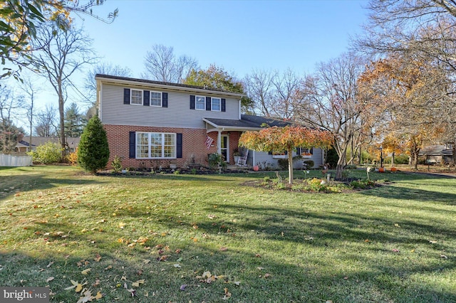 front facade featuring a front lawn