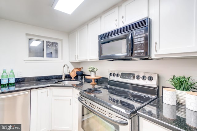 kitchen featuring white cabinets, sink, and stainless steel appliances