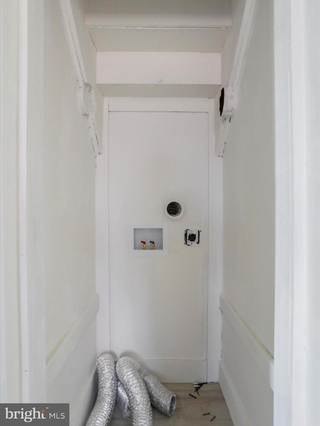 washroom with washer hookup, electric dryer hookup, and hardwood / wood-style flooring