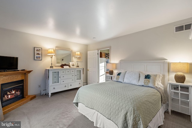 1324 River Rd, New Hope, PA 18938 - carpeted bedroom with a glass covered fireplace