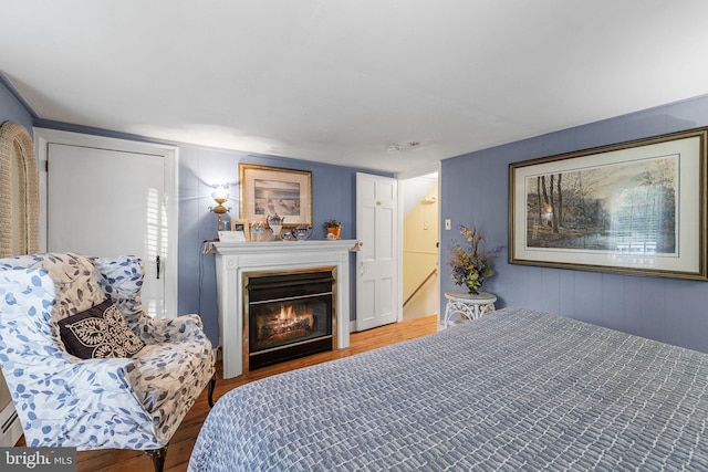 bedroom featuring hardwood / wood-style flooring