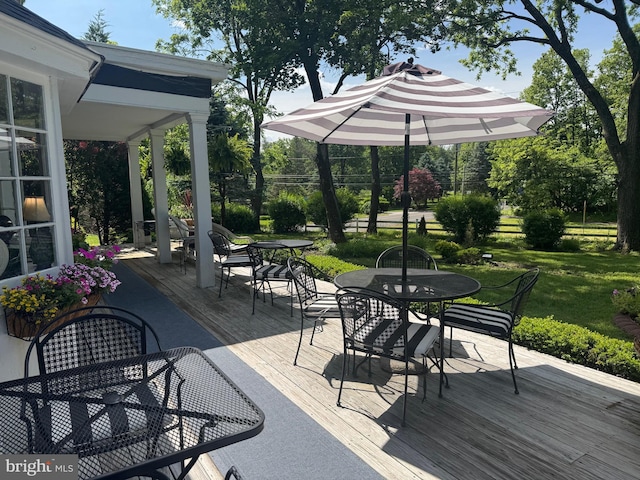 1324 River Rd, New Hope, PA 18938 - wooden deck with outdoor dining area and a yard