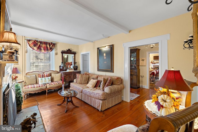 1324 River Rd, New Hope, PA 18938 - living room with wood-type flooring, beamed ceiling, and a chandelier