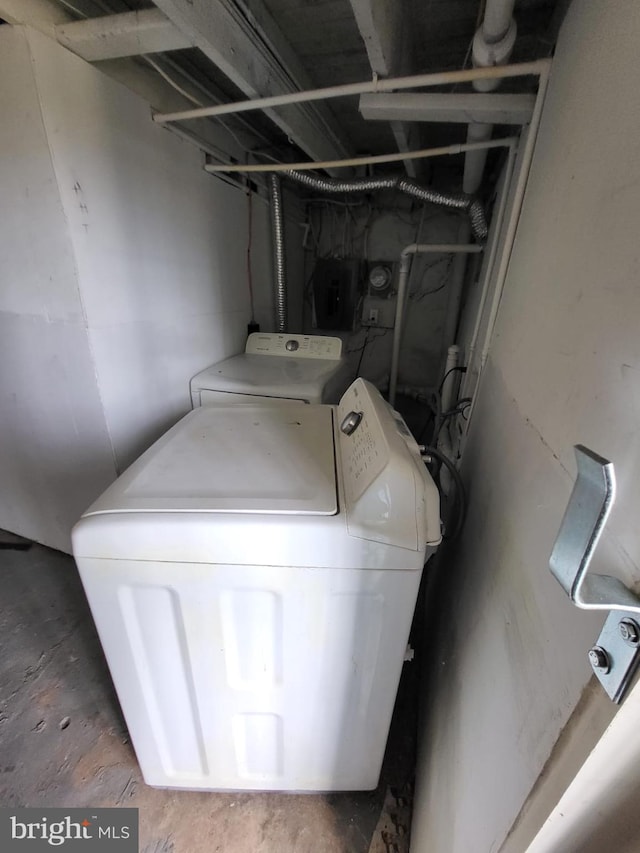 laundry room featuring separate washer and dryer